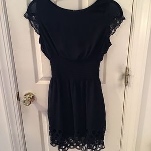 Navy blue dress with laser cut detail